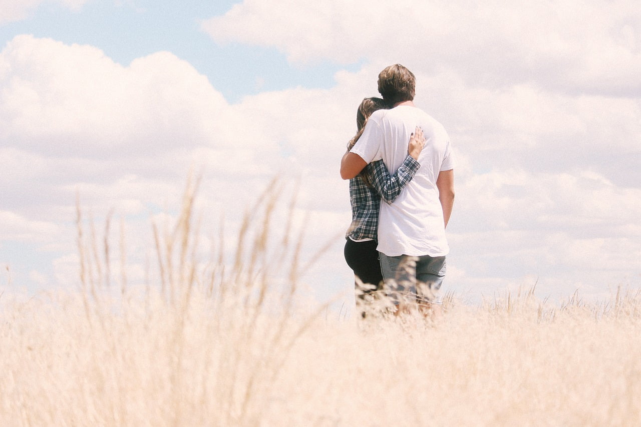 A couple together in the wild — protecting what they have